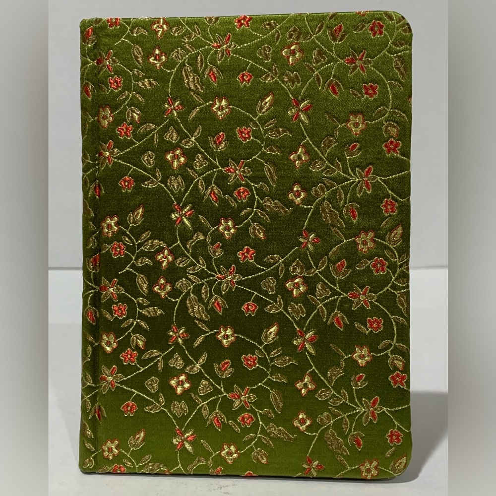 Silk like fabric covered blank notebook. Green/gold with flower design.